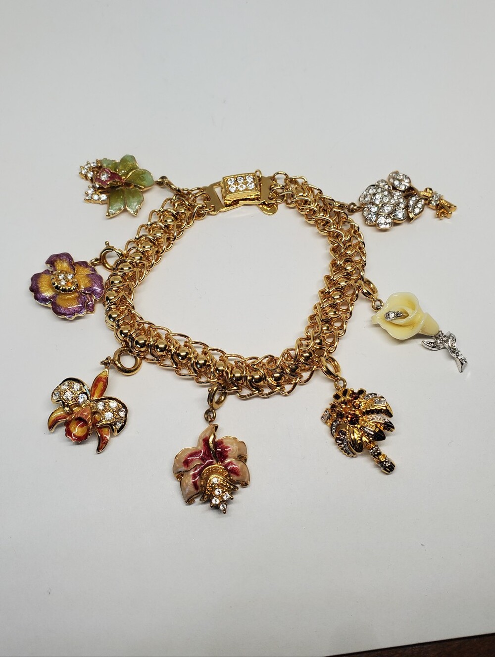 Vintage Nolan Miller Gold Tone Flower Charm Bracelet